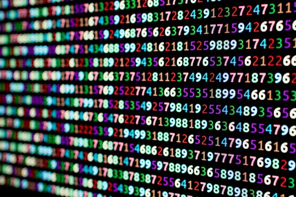 Lines and lines of different-colored numbers on a black background