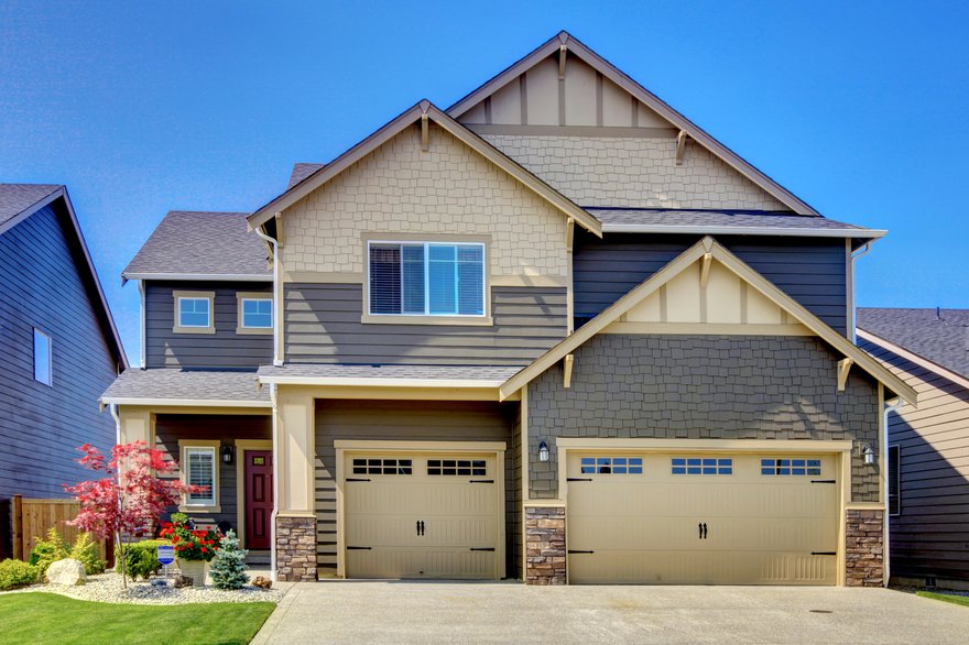 A two-story brick home.