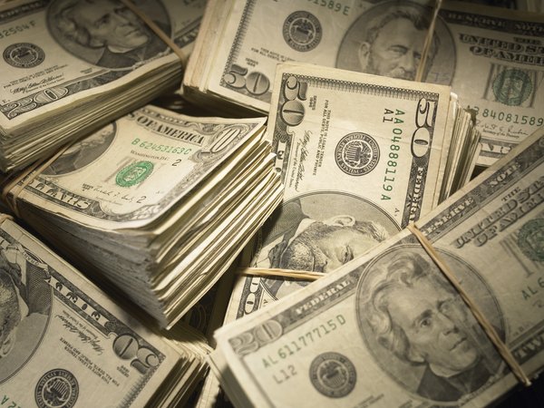 Large pile of assorted bills
