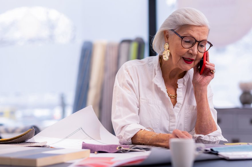 Person working and talking on phone.